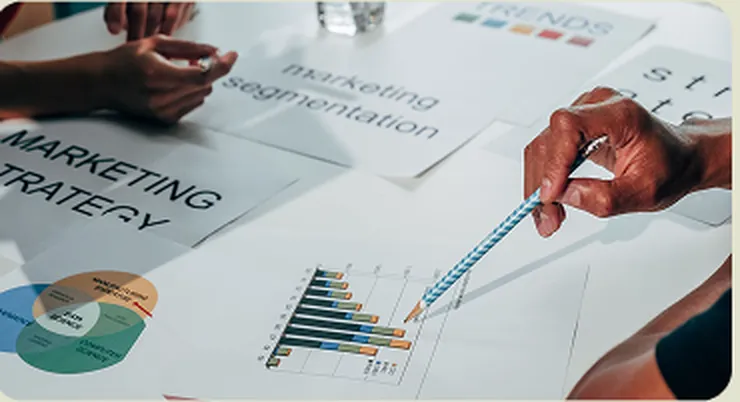 Marketing strategy and segmentation documents laid out on a table